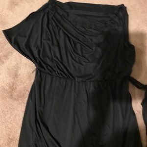 Beaded dress with drop front and back, has a belt